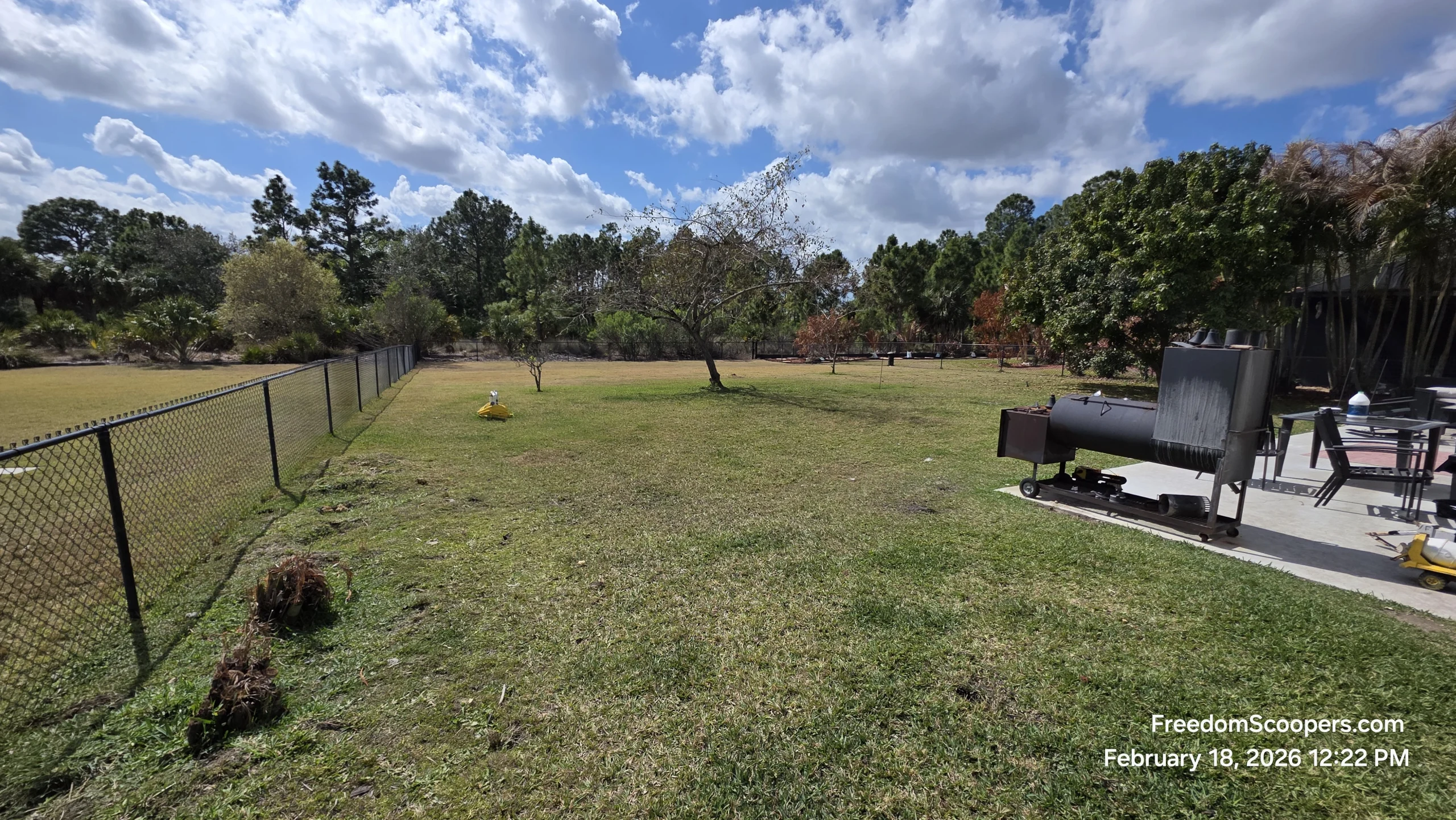 Freedom Scoopers dog poop removal service yard in Gateway