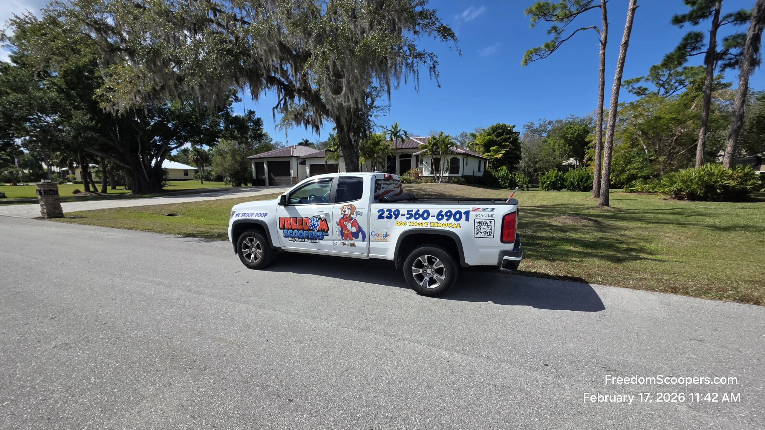Freedom Scoopers wrapped truck on a Southwest Florida cleanup route